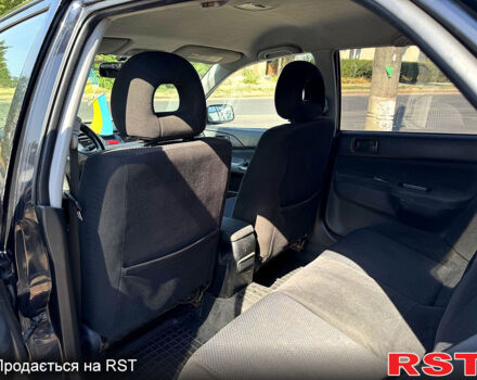 Черный Мицубиси Лансер, объемом двигателя 1.6 л и пробегом 300 тыс. км за 3599 $, фото 11 на Automoto.ua