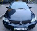 Чорний Міцубісі Lancer, об'ємом двигуна 1.6 л та пробігом 218 тис. км за 4300 $, фото 1 на Automoto.ua