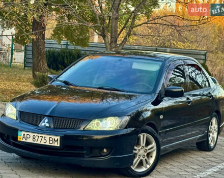 Міцубісі Lancer 2006 у Дніпро (Дніпропетровську) на Automoto.ua Чорний Міцубісі Lancer, об'ємом двигуна 2 л та пробігом 230 тис. км за 4900 $, фото 3 на Automoto.ua