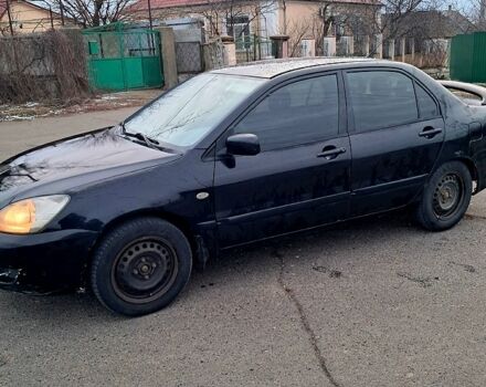 Чорний Міцубісі Lancer, об'ємом двигуна 1.6 л та пробігом 297 тис. км за 2100 $, фото 6 на Automoto.ua