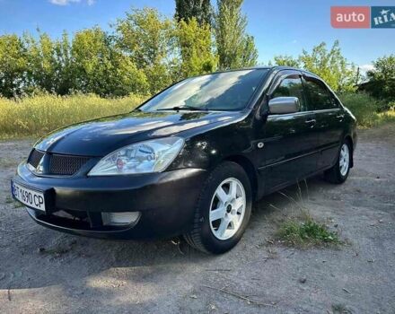 Мицубиси Лансер 2006 в Киеве на Automoto.ua Черный Мицубиси Лансер, объемом двигателя 1.58 л и пробегом 268 тыс. км за 3400 $, фото 1 на Automoto.ua