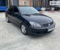 Чорний Міцубісі Lancer, об'ємом двигуна 2 л та пробігом 186 тис. км за 2750 $, фото 1 на Automoto.ua