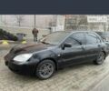 Черный Мицубиси Лансер, объемом двигателя 1.6 л и пробегом 200 тыс. км за 4200 $, фото 3 на Automoto.ua