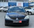Черный Мицубиси Лансер, объемом двигателя 1.6 л и пробегом 280 тыс. км за 4490 $, фото 1 на Automoto.ua