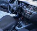 Черный Мицубиси Лансер, объемом двигателя 1.58 л и пробегом 215 тыс. км за 5400 $, фото 10 на Automoto.ua