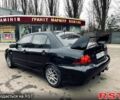 Чорний Міцубісі Lancer, об'ємом двигуна 1.6 л та пробігом 258 тис. км за 3900 $, фото 1 на Automoto.ua