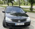 Чорний Міцубісі Lancer, об'ємом двигуна 1.6 л та пробігом 248 тис. км за 4300 $, фото 1 на Automoto.ua