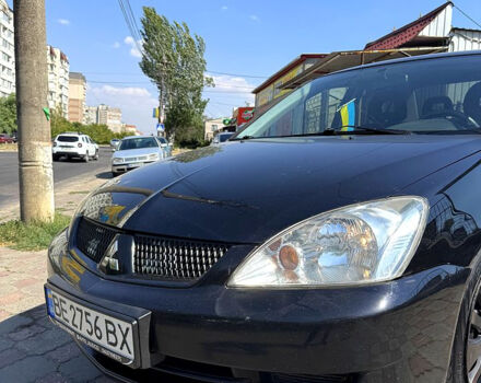 Черный Мицубиси Лансер, объемом двигателя 1.6 л и пробегом 300 тыс. км за 3599 $, фото 3 на Automoto.ua