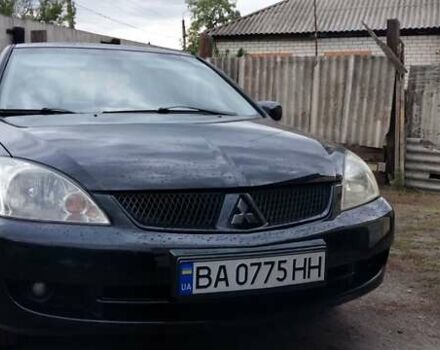 Чорний Міцубісі Lancer, об'ємом двигуна 1.59 л та пробігом 185 тис. км за 4900 $, фото 9 на Automoto.ua