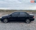 Чорний Міцубісі Lancer, об'ємом двигуна 1.6 л та пробігом 335 тис. км за 3500 $, фото 1 на Automoto.ua