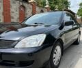 Чорний Міцубісі Lancer, об'ємом двигуна 1.58 л та пробігом 198 тис. км за 4300 $, фото 1 на Automoto.ua