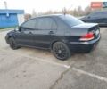 Чорний Міцубісі Lancer, об'ємом двигуна 1.58 л та пробігом 290 тис. км за 3200 $, фото 11 на Automoto.ua