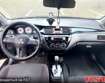 Мицубиси Лансер 2006 в Николаеве на Automoto.ua Черный Мицубиси Лансер, объемом двигателя 1.6 л и пробегом 260 тыс. км за 4999 $, фото 1 на Automoto.ua