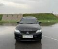 Черный Мицубиси Лансер, объемом двигателя 1.58 л и пробегом 244 тыс. км за 4500 $, фото 1 на Automoto.ua