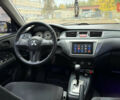 Чорний Міцубісі Lancer, об'ємом двигуна 1.58 л та пробігом 386 тис. км за 4450 $, фото 18 на Automoto.ua