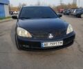 Чорний Міцубісі Lancer, об'ємом двигуна 1.58 л та пробігом 290 тис. км за 3200 $, фото 8 на Automoto.ua