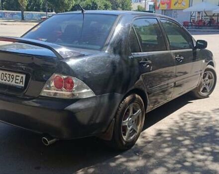 Чорний Міцубісі Lancer, об'ємом двигуна 1.6 л та пробігом 240 тис. км за 3900 $, фото 3 на Automoto.ua