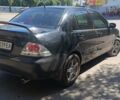 Чорний Міцубісі Lancer, об'ємом двигуна 1.6 л та пробігом 240 тис. км за 3900 $, фото 3 на Automoto.ua