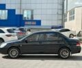 Черный Мицубиси Лансер, объемом двигателя 1.6 л и пробегом 280 тыс. км за 4490 $, фото 7 на Automoto.ua