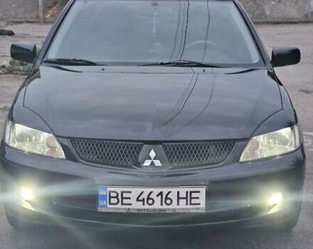 Чорний Міцубісі Lancer, об'ємом двигуна 1.6 л та пробігом 350 тис. км за 4950 $, фото 2 на Automoto.ua