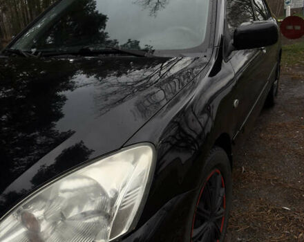 Чорний Міцубісі Lancer, об'ємом двигуна 1.58 л та пробігом 210 тис. км за 3900 $, фото 2 на Automoto.ua