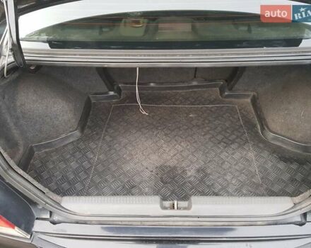 Чорний Міцубісі Lancer, об'ємом двигуна 1.58 л та пробігом 290 тис. км за 3200 $, фото 19 на Automoto.ua