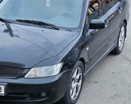 Чорний Міцубісі Lancer, об'ємом двигуна 1.6 л та пробігом 350 тис. км за 4950 $, фото 1 на Automoto.ua