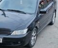 Чорний Міцубісі Lancer, об'ємом двигуна 1.6 л та пробігом 350 тис. км за 4950 $, фото 1 на Automoto.ua