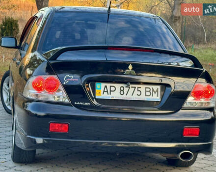 Міцубісі Lancer 2006 у Дніпро (Дніпропетровську) на Automoto.ua Чорний Міцубісі Lancer, об'ємом двигуна 2 л та пробігом 230 тис. км за 4900 $, фото 7 на Automoto.ua