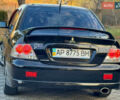 Міцубісі Lancer 2006 у Дніпро (Дніпропетровську) на Automoto.ua Чорний Міцубісі Lancer, об'ємом двигуна 2 л та пробігом 230 тис. км за 4900 $, фото 7 на Automoto.ua