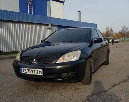 Чорний Міцубісі Lancer, об'ємом двигуна 1.58 л та пробігом 290 тис. км за 3200 $, фото 1 на Automoto.ua