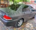 Чорний Міцубісі Lancer, об'ємом двигуна 1.58 л та пробігом 280 тис. км за 3950 $, фото 4 на Automoto.ua