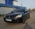 Чорний Міцубісі Lancer, об'ємом двигуна 1.58 л та пробігом 290 тис. км за 3200 $, фото 1 на Automoto.ua