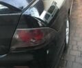 Черный Мицубиси Лансер, объемом двигателя 2 л и пробегом 220 тыс. км за 5000 $, фото 5 на Automoto.ua