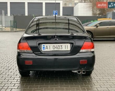 Чорний Міцубісі Lancer, об'ємом двигуна 1.58 л та пробігом 270 тис. км за 3950 $, фото 3 на Automoto.ua