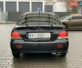 Чорний Міцубісі Lancer, об'ємом двигуна 1.58 л та пробігом 270 тис. км за 3950 $, фото 3 на Automoto.ua