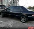 Чорний Міцубісі Lancer, об'ємом двигуна 1.6 л та пробігом 329 тис. км за 3500 $, фото 4 на Automoto.ua