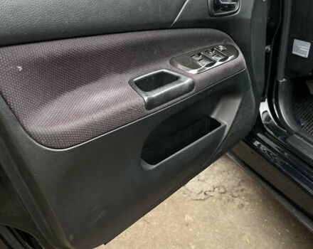 Чорний Міцубісі Lancer, об'ємом двигуна 2 л та пробігом 242 тис. км за 5900 $, фото 11 на Automoto.ua