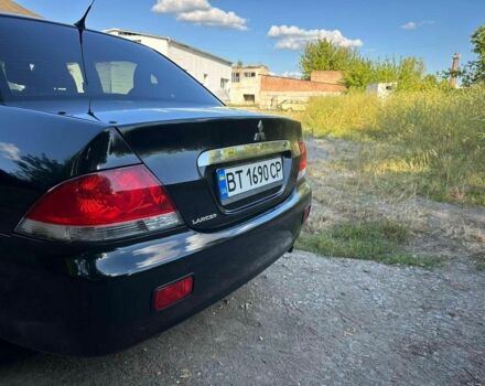 Черный Мицубиси Лансер, объемом двигателя 1.6 л и пробегом 289 тыс. км за 3200 $, фото 14 на Automoto.ua