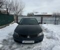 Черный Мицубиси Лансер, объемом двигателя 2 л и пробегом 380 тыс. км за 3500 $, фото 1 на Automoto.ua