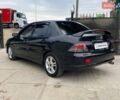 Чорний Міцубісі Lancer, об'ємом двигуна 2 л та пробігом 248 тис. км за 4990 $, фото 4 на Automoto.ua