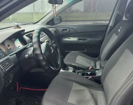 Черный Мицубиси Лансер, объемом двигателя 1.6 л и пробегом 368 тыс. км за 3200 $, фото 7 на Automoto.ua