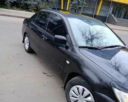 Чорний Міцубісі Lancer, об'ємом двигуна 1.6 л та пробігом 218 тис. км за 4300 $, фото 9 на Automoto.ua
