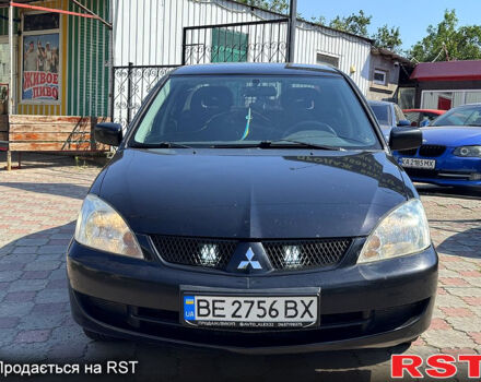 Черный Мицубиси Лансер, объемом двигателя 1.6 л и пробегом 300 тыс. км за 3599 $, фото 1 на Automoto.ua