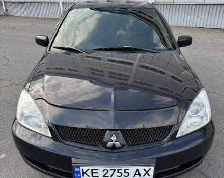 Черный Мицубиси Лансер, объемом двигателя 1.59 л и пробегом 221 тыс. км за 4200 $, фото 4 на Automoto.ua