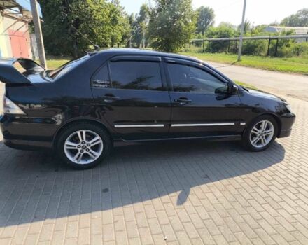 Чорний Міцубісі Lancer, об'ємом двигуна 2 л та пробігом 240 тис. км за 5600 $, фото 1 на Automoto.ua