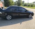 Чорний Міцубісі Lancer, об'ємом двигуна 2 л та пробігом 240 тис. км за 5600 $, фото 1 на Automoto.ua