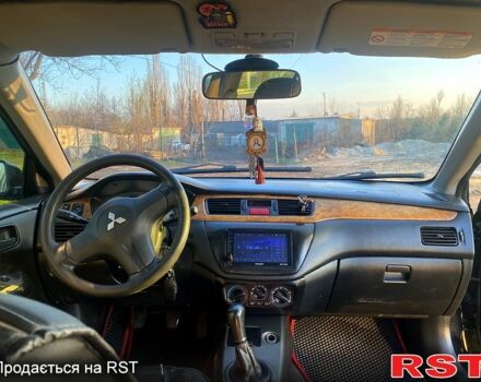 Чорний Міцубісі Lancer, об'ємом двигуна 1.6 л та пробігом 330 тис. км за 4500 $, фото 4 на Automoto.ua
