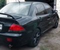 Чорний Міцубісі Lancer, об'ємом двигуна 1.59 л та пробігом 185 тис. км за 4900 $, фото 8 на Automoto.ua
