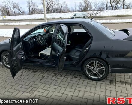 Чорний Міцубісі Lancer, об'ємом двигуна 2 л та пробігом 270 тис. км за 4499 $, фото 13 на Automoto.ua